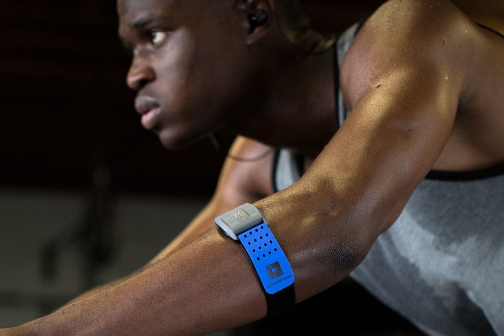 man wearing Rhythm+ Heart Rate Monitor