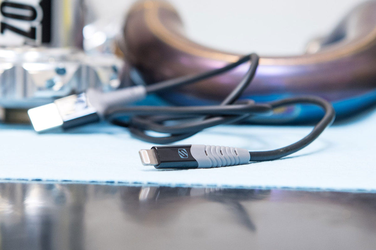 close up of Scosche lightning cable on desk