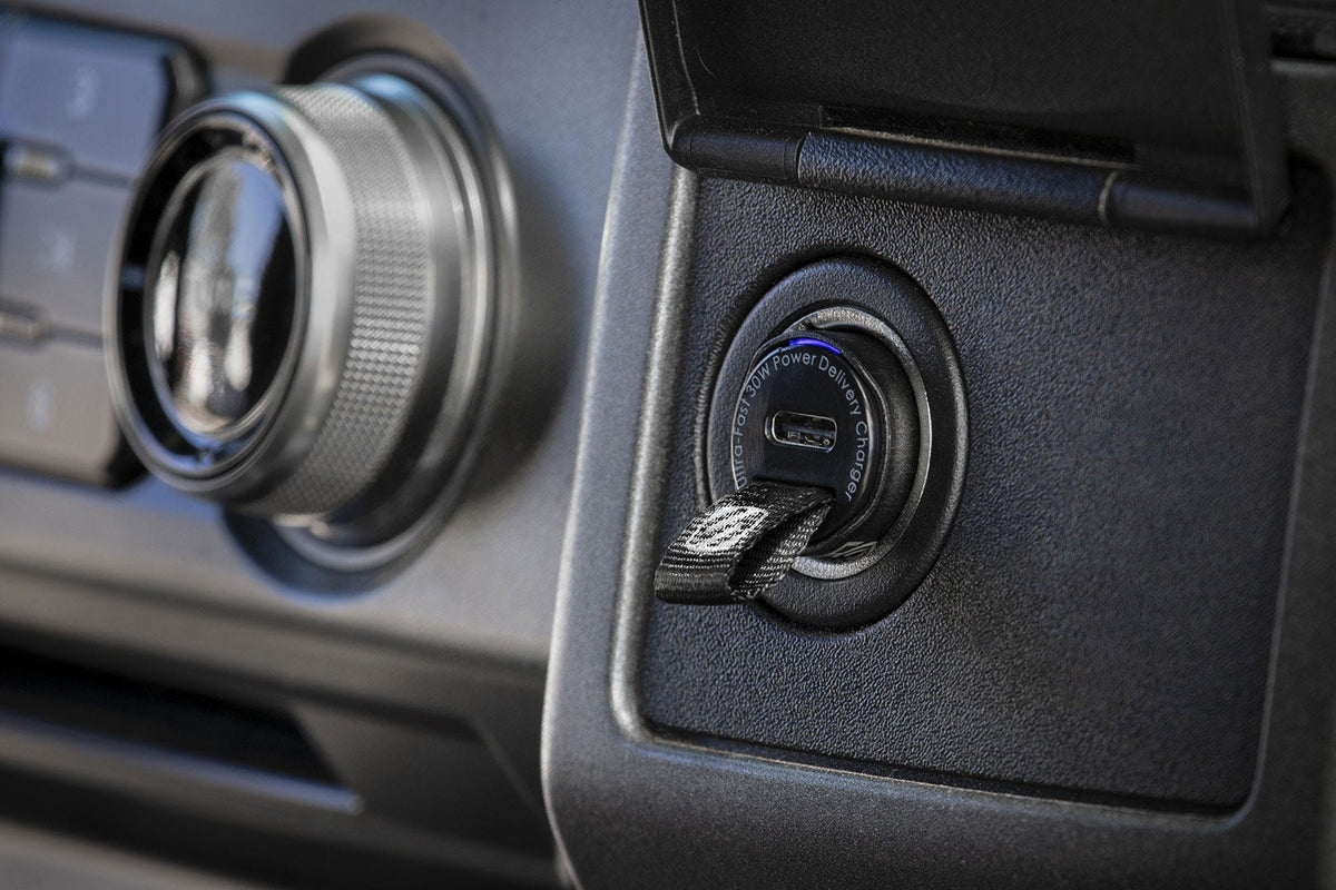 Close up of Scosche phone charger in car 12V socket
