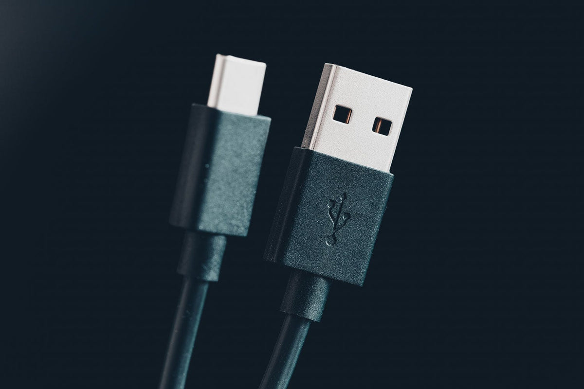 close up of black USB-A to USB-C cable