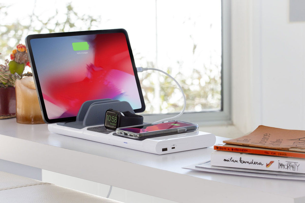 modular charging pad charging iphon and apple watch with ipad charging via cable on vertical slotted charging pad
