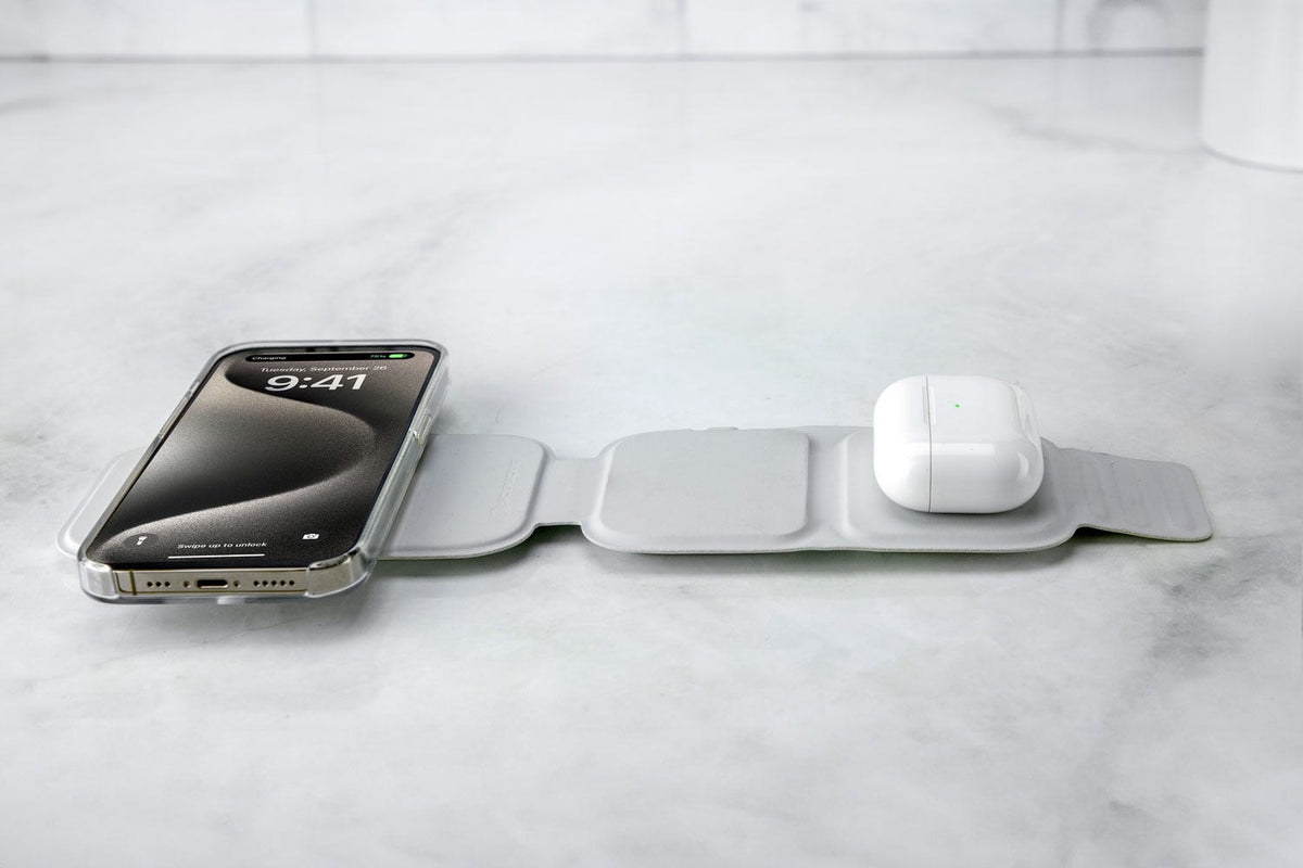 iphone and Airpods charging on folding wireless charger