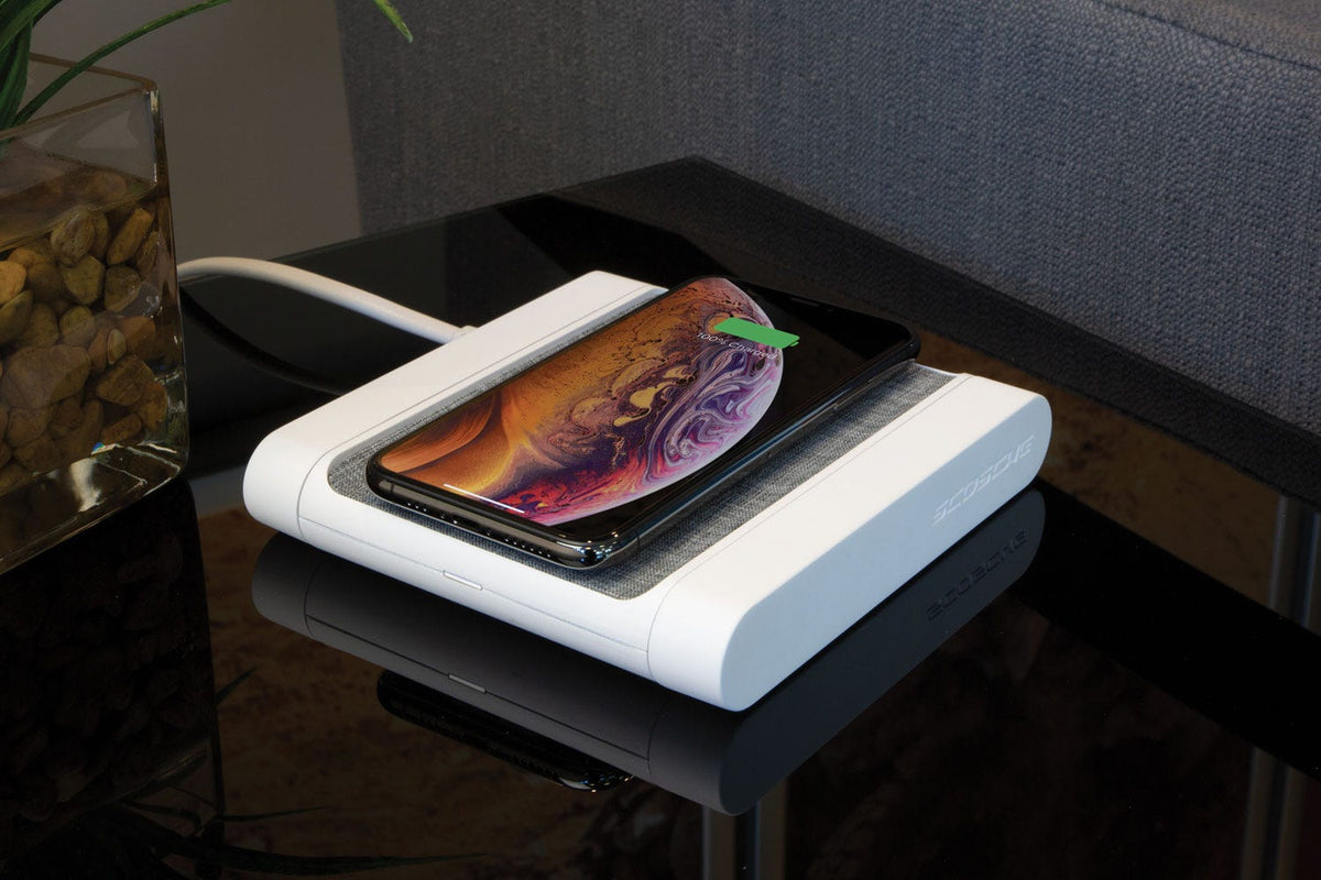 iphone charging via Scosche magsafe wireless charging pad on table