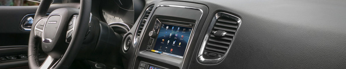 Interior of a vehile with a custom dash kit installed for an aftermarket stereo system
