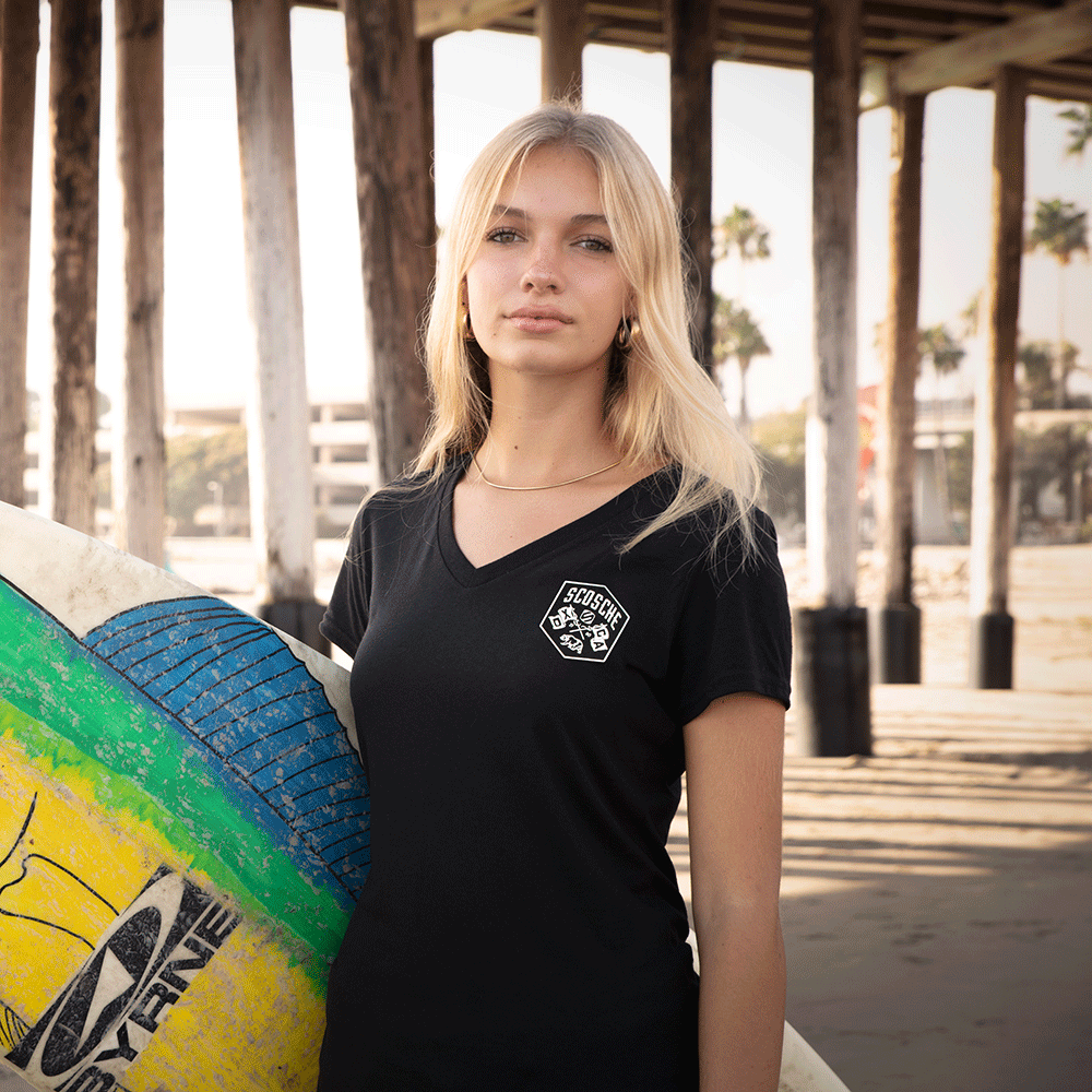 Woman wearing Scosche Ladies' Tee with Bear Logo
