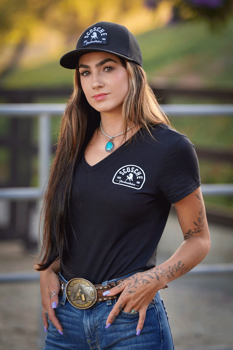 Woman wearing Scosche Ladies' Tee with Bronco Logo