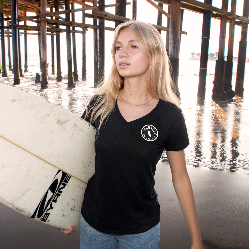 Woman wearing Scosche Ladies' Tee with Cali Logo