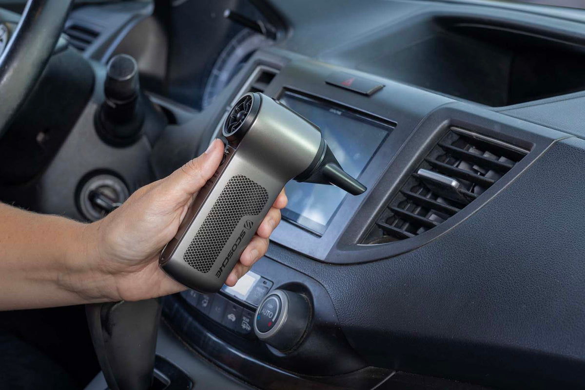 duster cleaning car vent