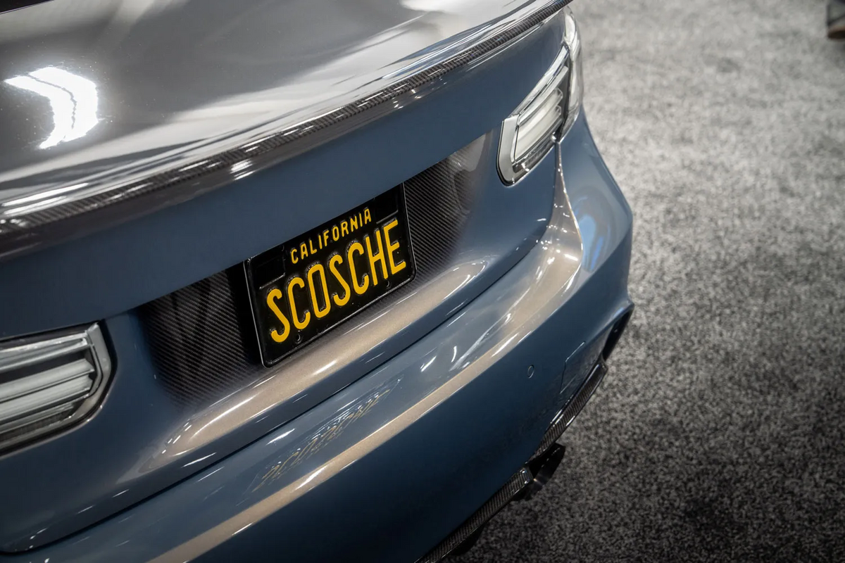 Back of BMW with vanity license place that says SCOSCHE