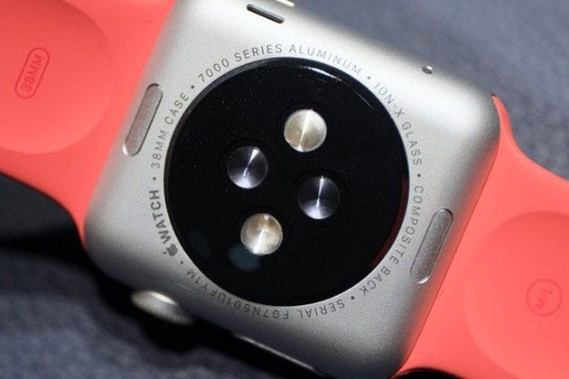 close up of apple watch face with pink band