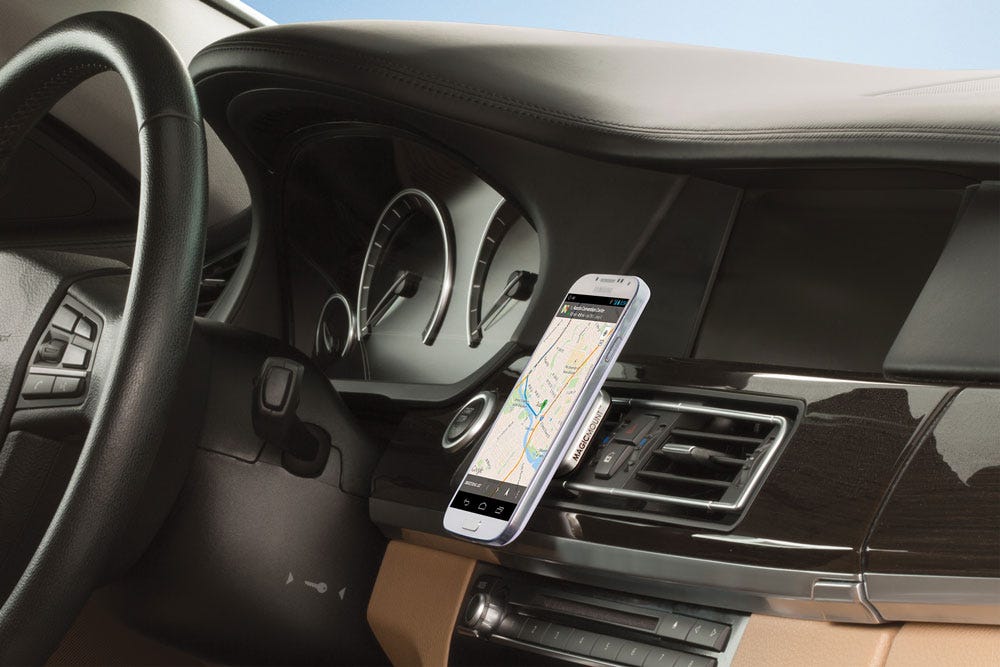 iphone showing map mounted to car air vent