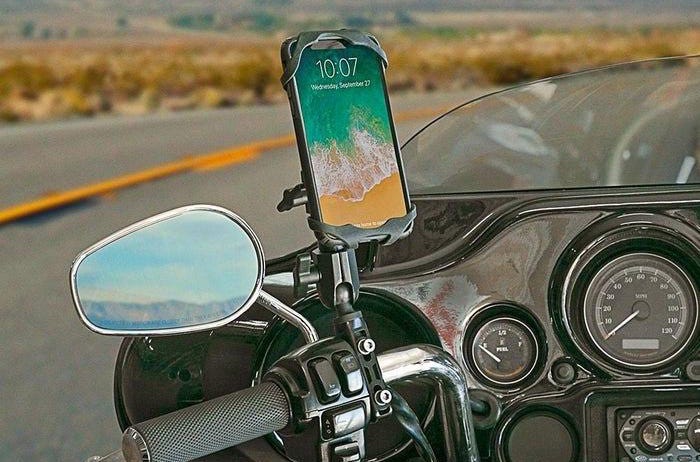 iphone in motorcycle mount on handlebar