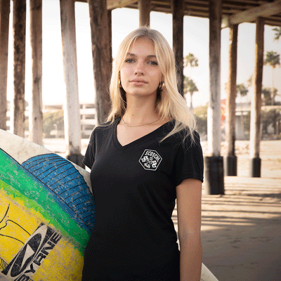 Woman wearing Scosche Ladies' Tee with Bear Logo