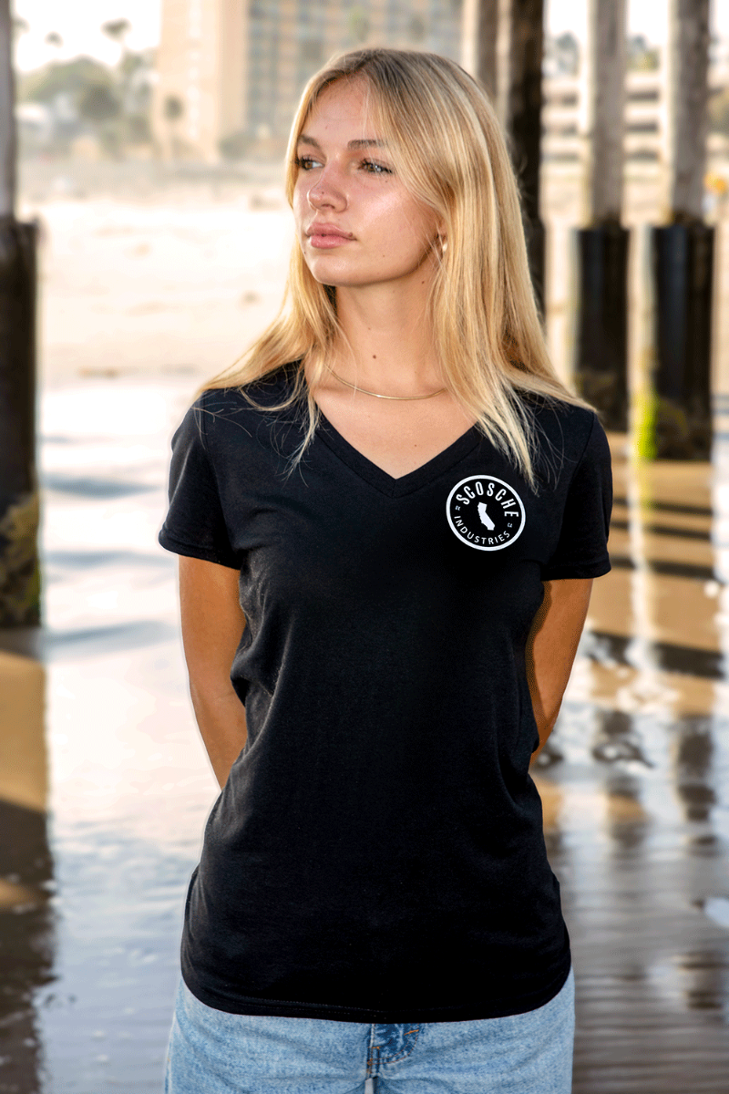 Woman wearing Scosche Ladies' Tee with Cali Logo