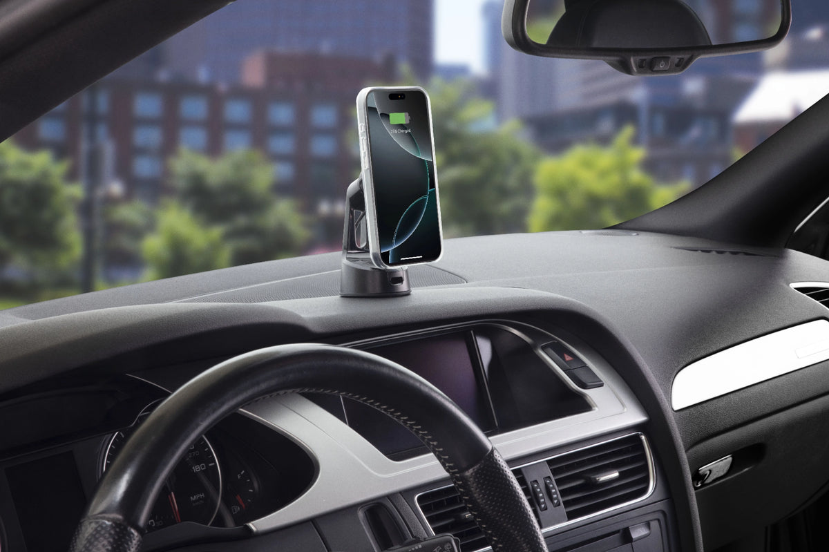 Phone on mount attached to vehicle dashboard