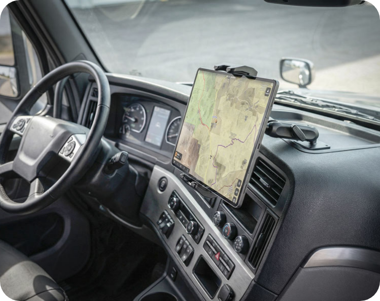 Image of the dashboard of a vehicle with a large tablet mounted to it