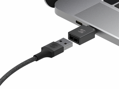 charging cable and cable adapter plugged into laptop