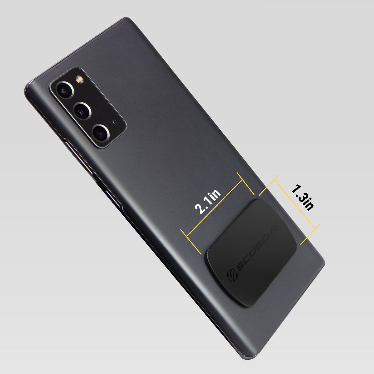 MagicPlate attached to phone measures 2.1 inches wide and 1.3 inches high